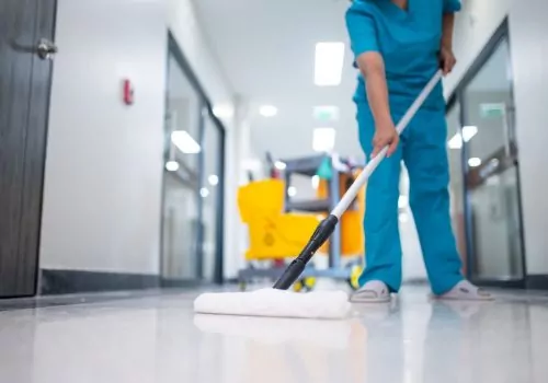 cleaner-using-mops-cleaner-with-mop-uniform-cleaning-hall-floor-hospital-cleaning-floor-with-mop-patient-room-hospital-epoxy-floor